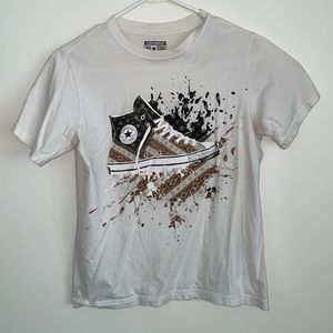 White converse T-shirt with red, white, and blue design